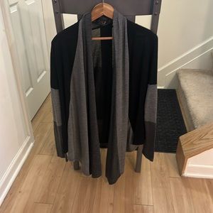 Black and gray color block sweater.  Size M